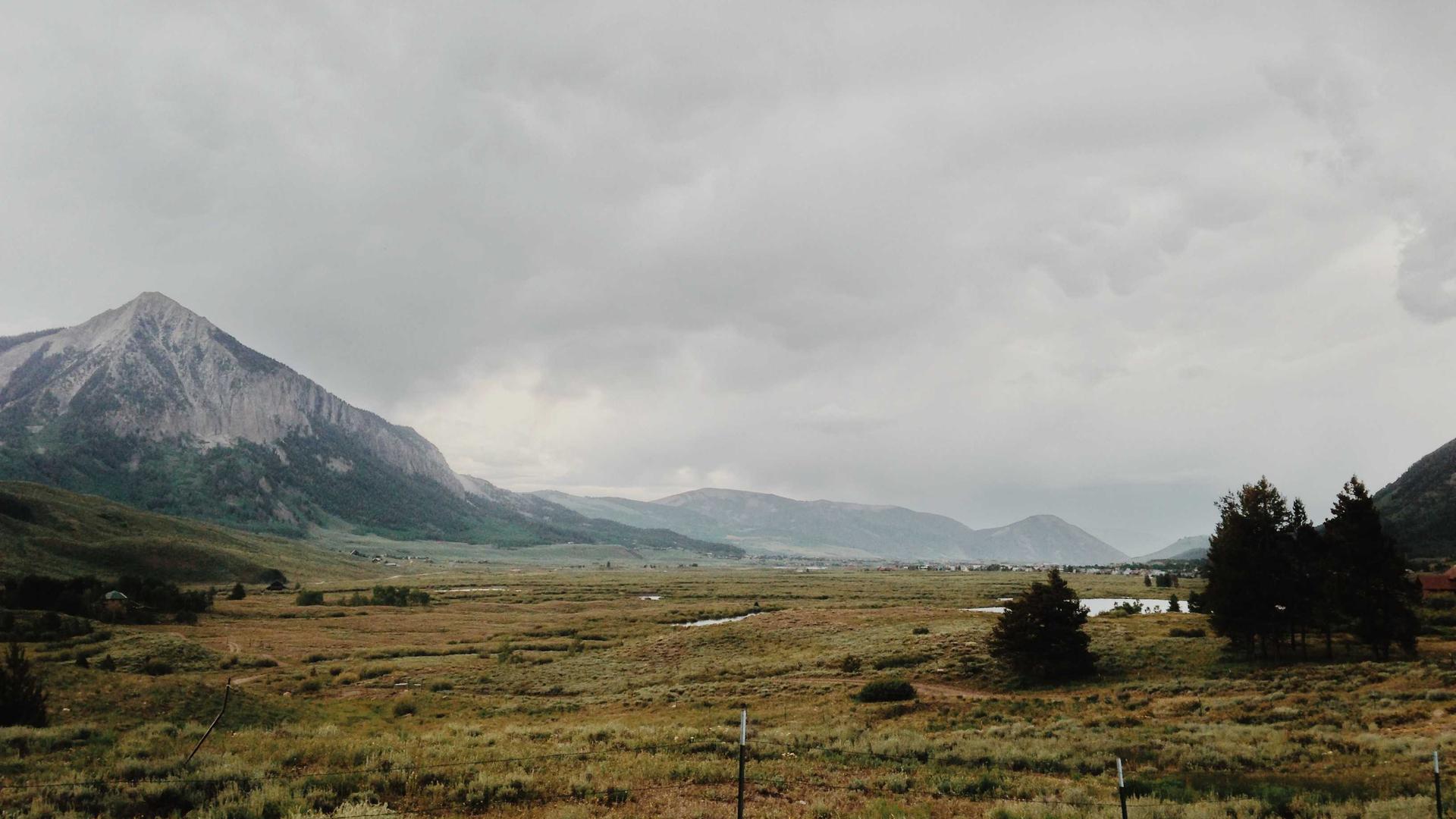Pressure washing a deck.